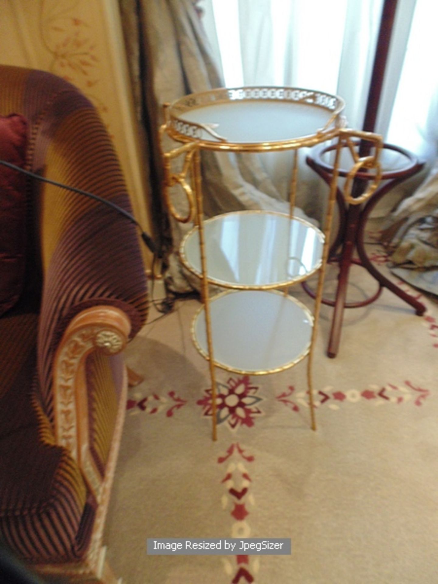 Directoire Period reproduction three tier gilded bronze gueridon with 24ct. gold finish each tier