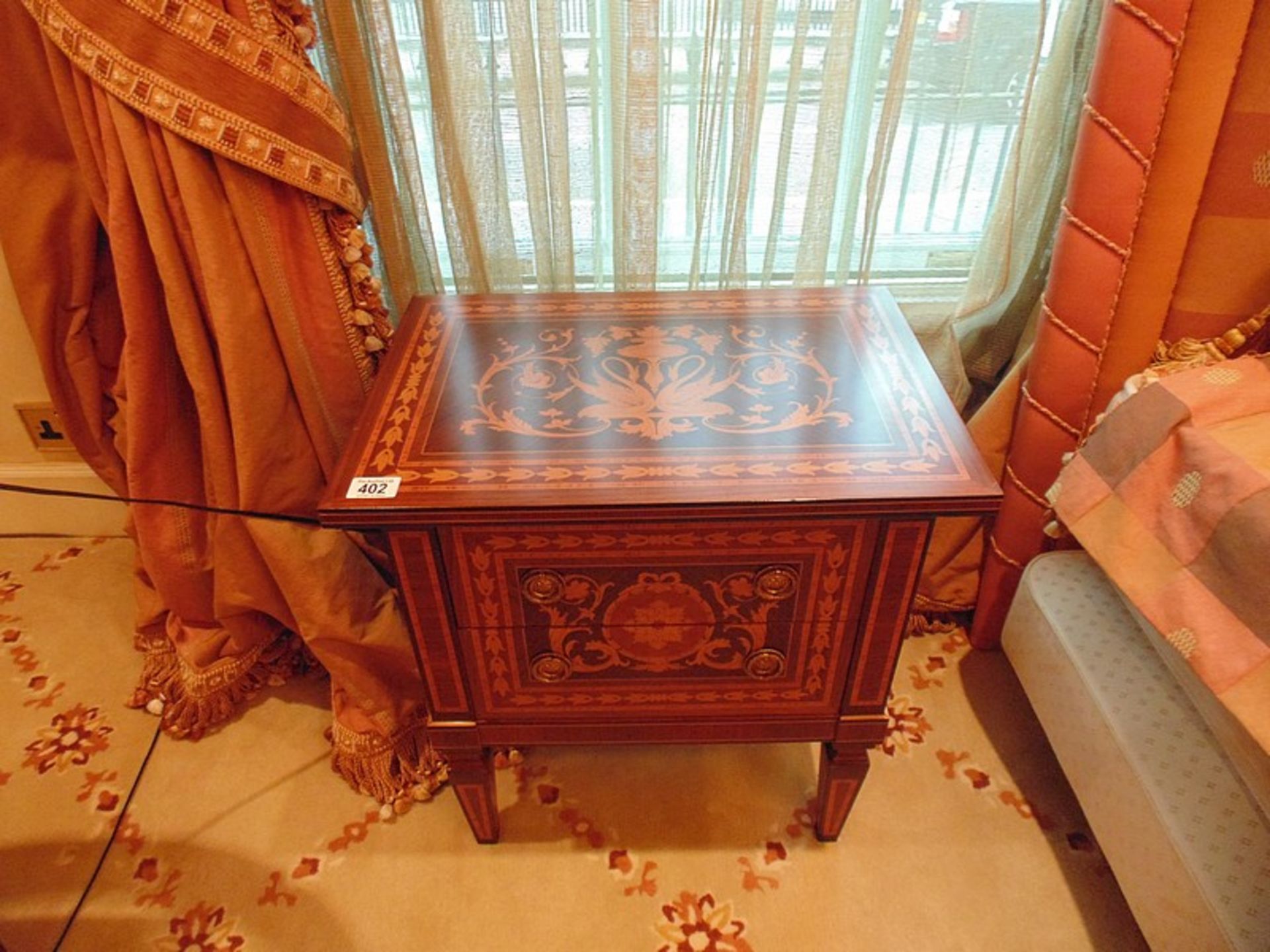 A fine pair of mid-19th century Italian style inlaid marquetry commodes with a single drawer over