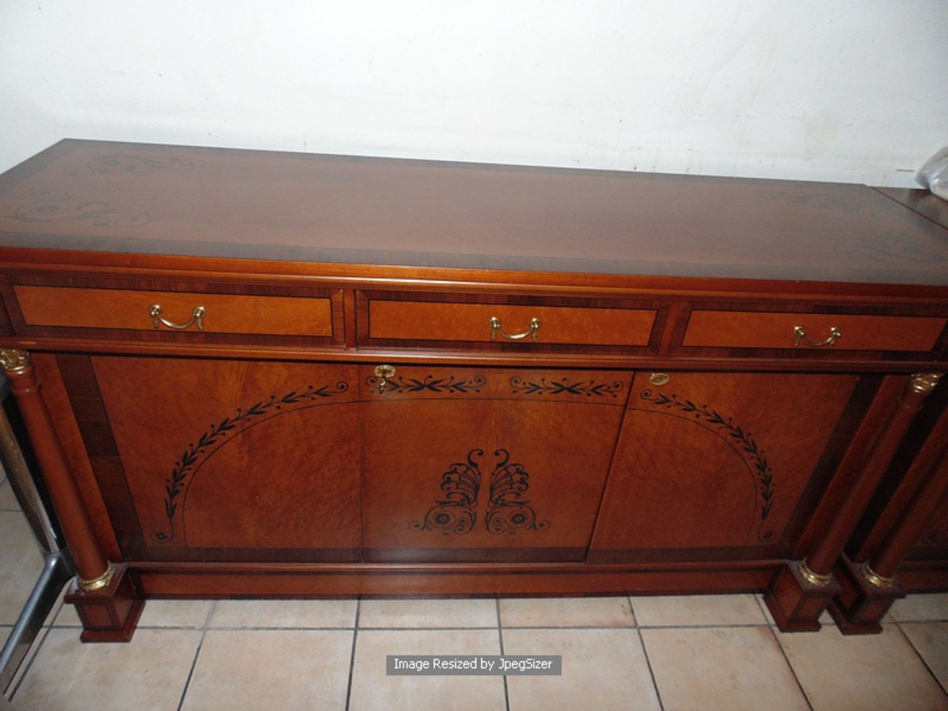 A flame mahogany sideboard in the French Empire style, with fluted quiver terminals, the straight - Image 3 of 5