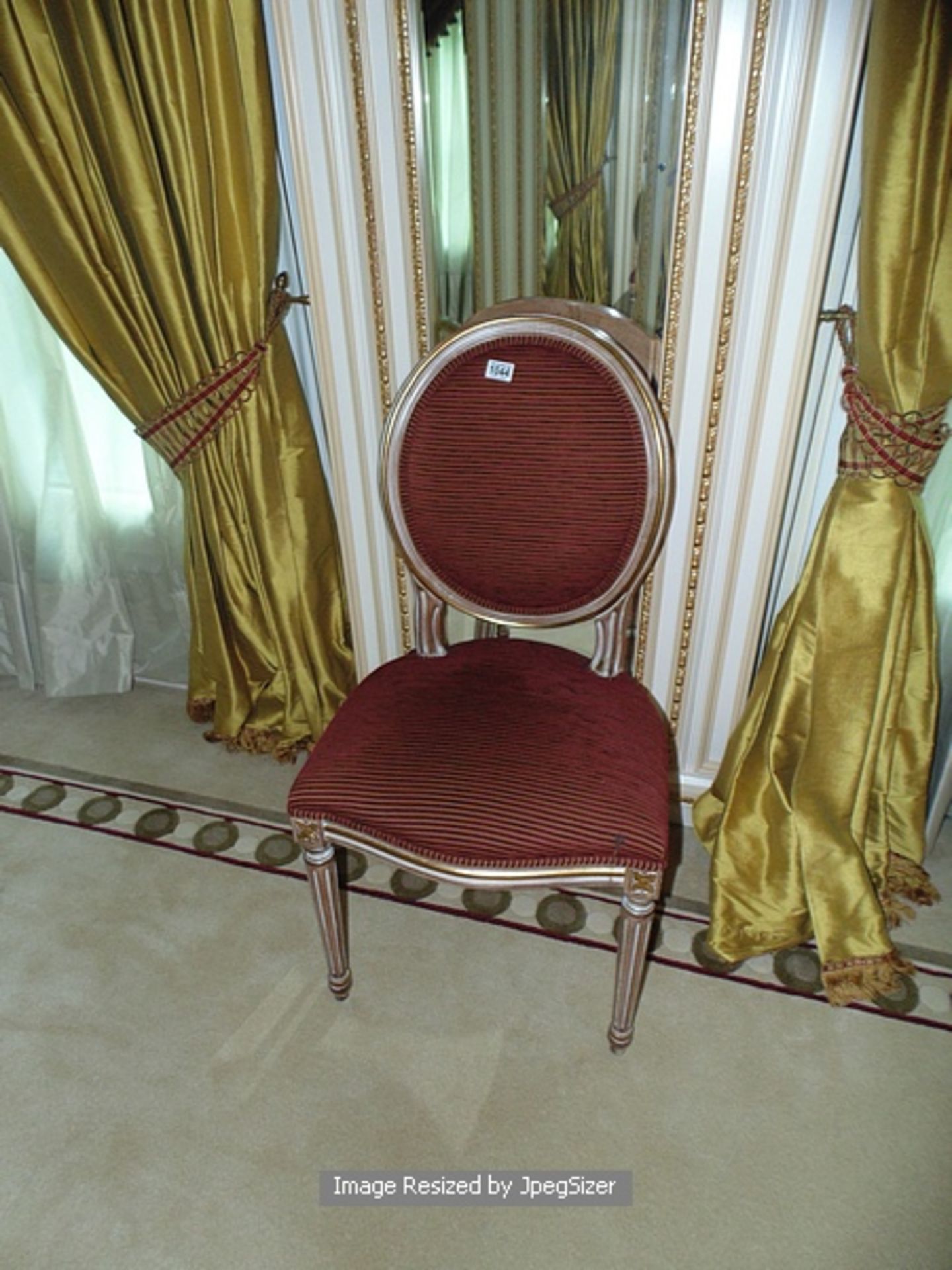 Italian Neoclassical arm chair carved crest over the upholstered oval back raised on round fluted