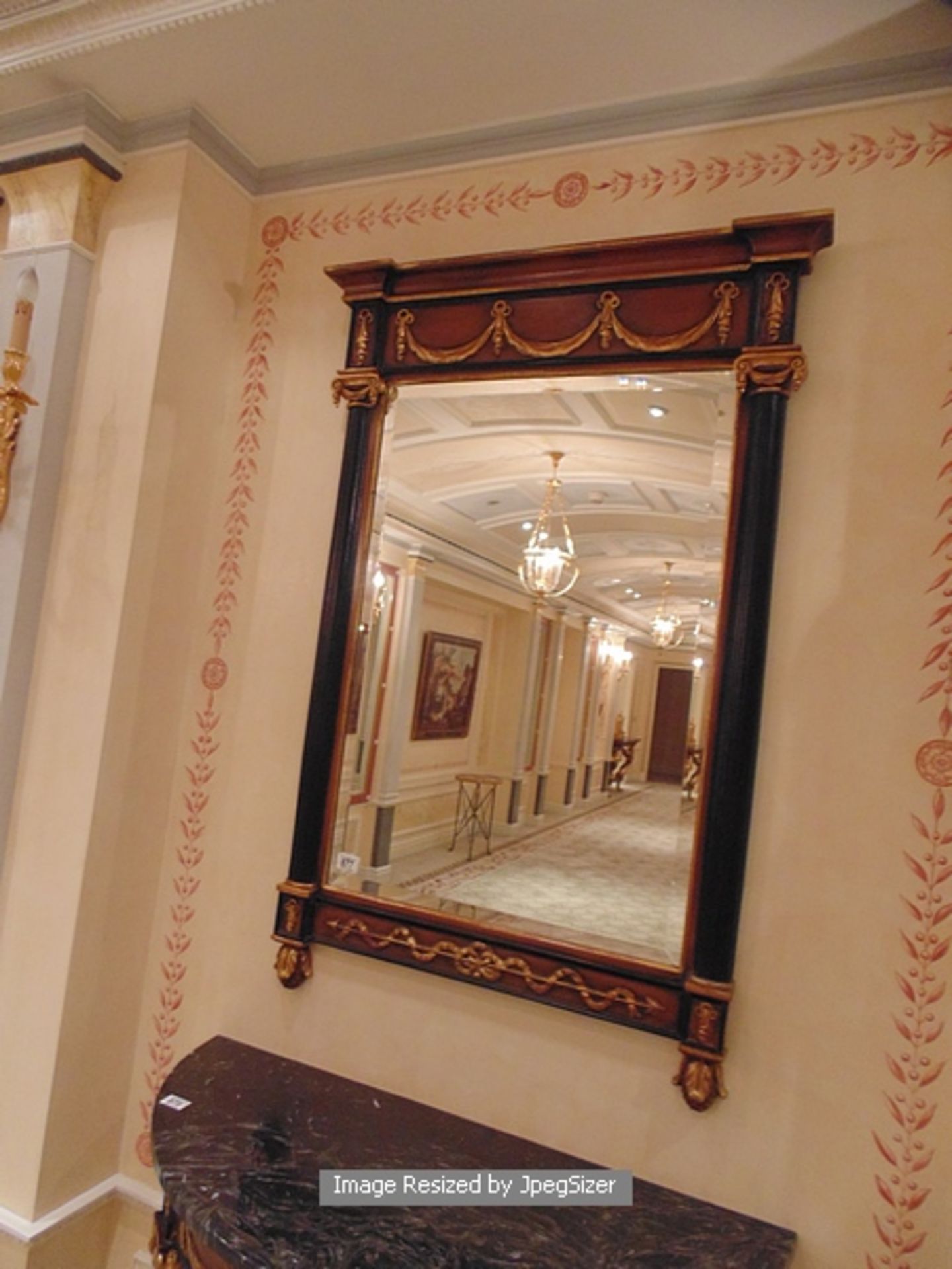 Empire style pier mirror, with a closed pediment top, classical carved gilt-wood applied