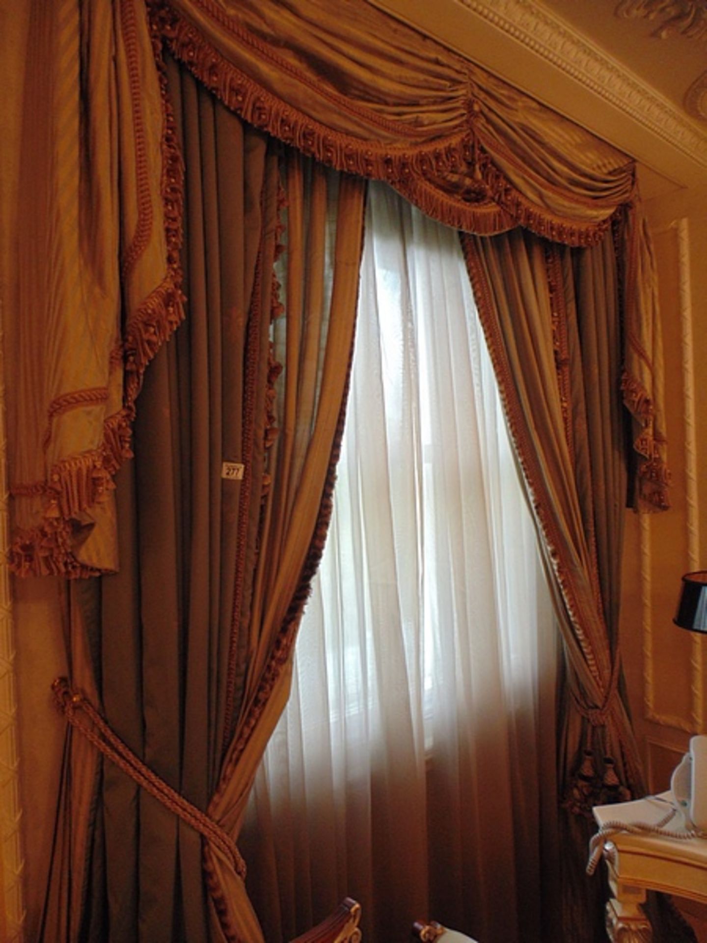 A pair of curtains supplied by Jacquard from Rudolph Ackermann`s A series design with elaborate
