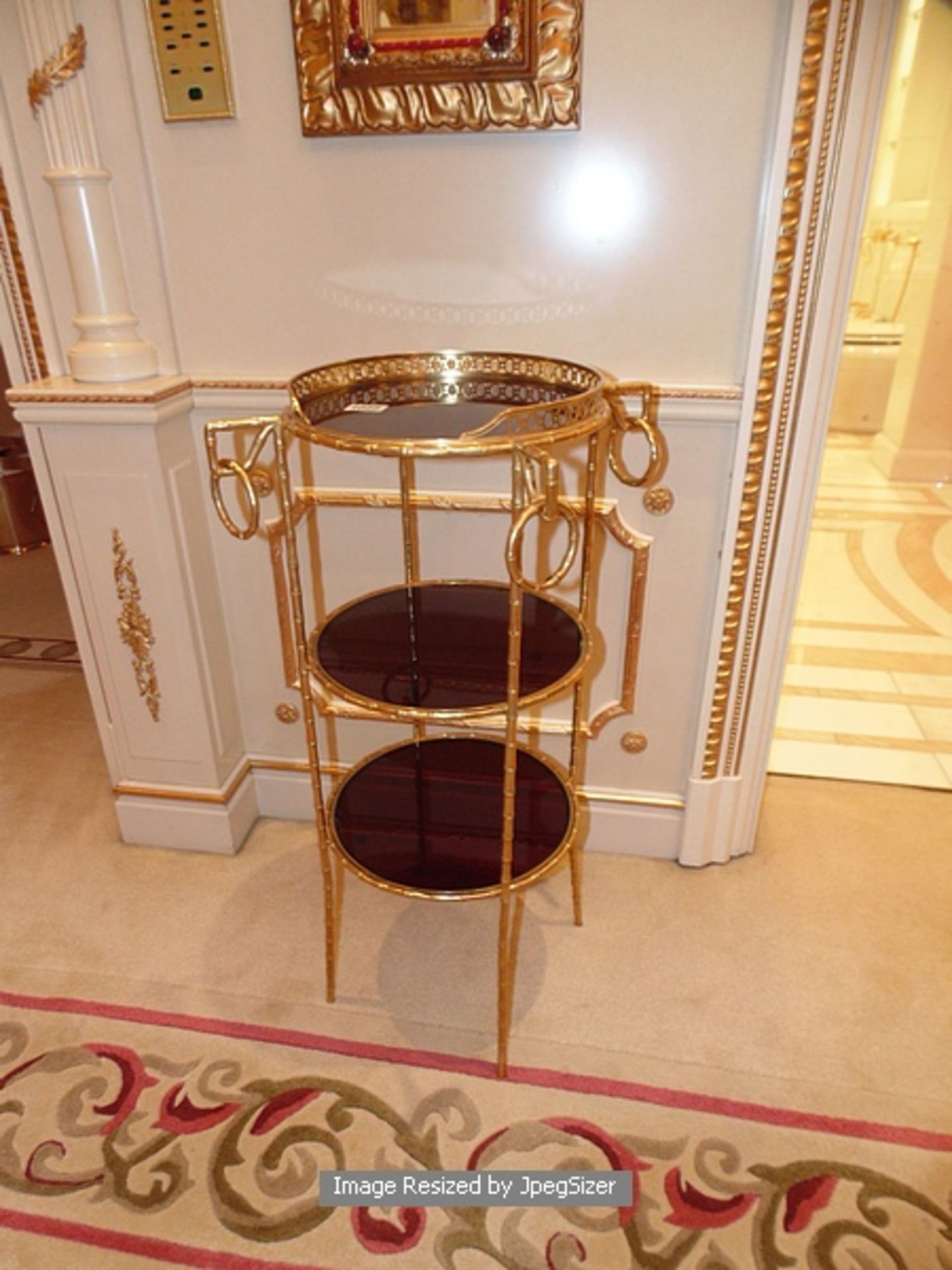 Directoire Period reproduction three tier gilded bronze gueridon with 24ct. gold finish each tier