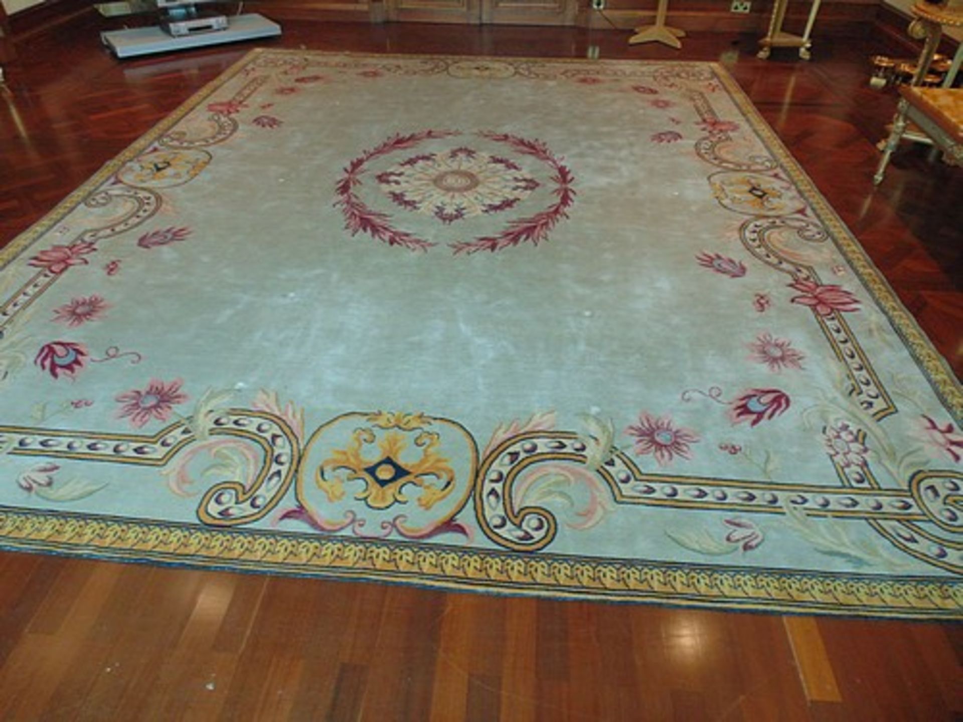 A sumptuous 100% pure new wool carpet 3570mm x 4320mm pale blue grey field with a central