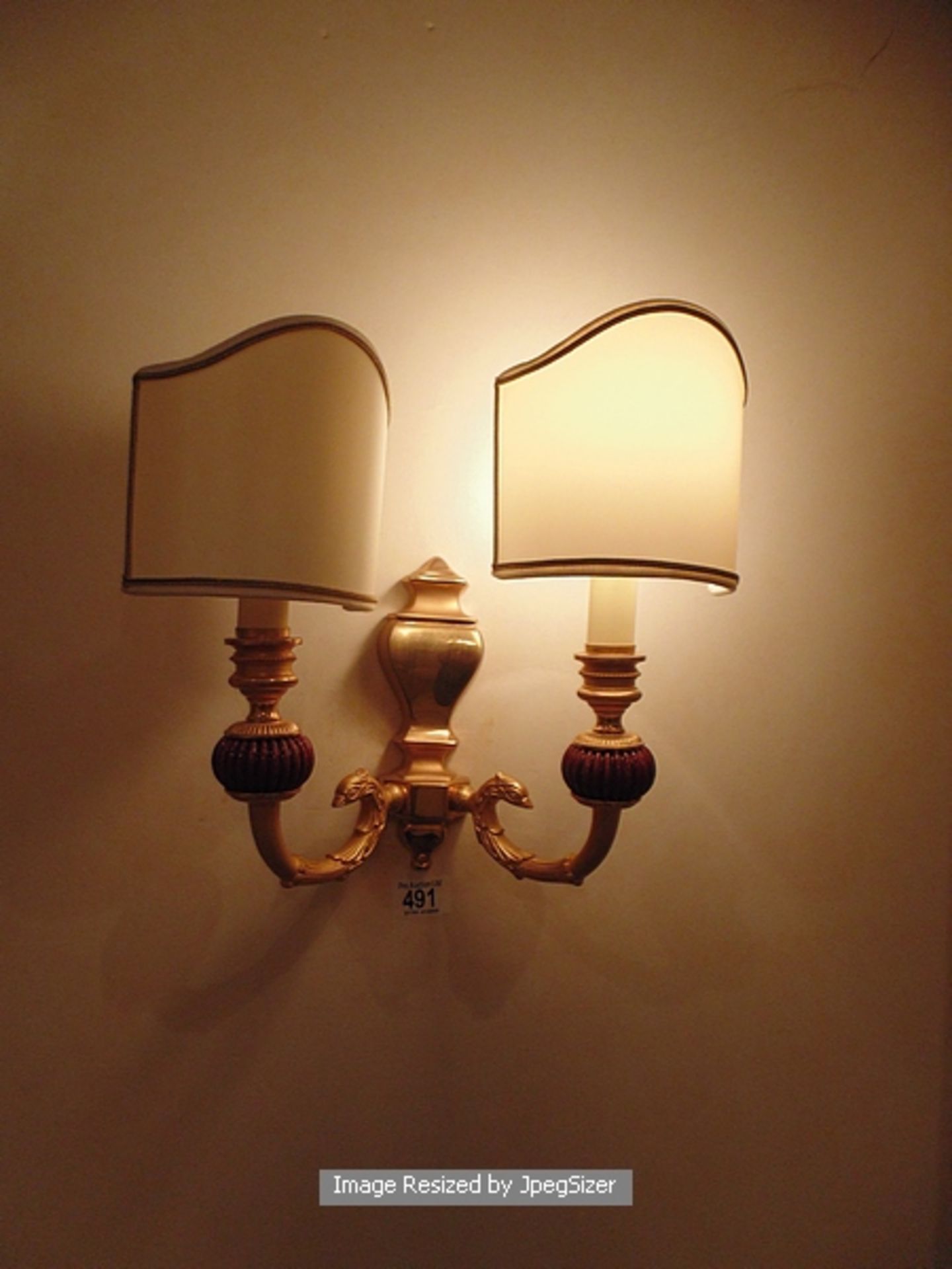 A pair of Laudarte T400/10 2 candle wall light, bronze castings, with enamelled parts 24ct. gold