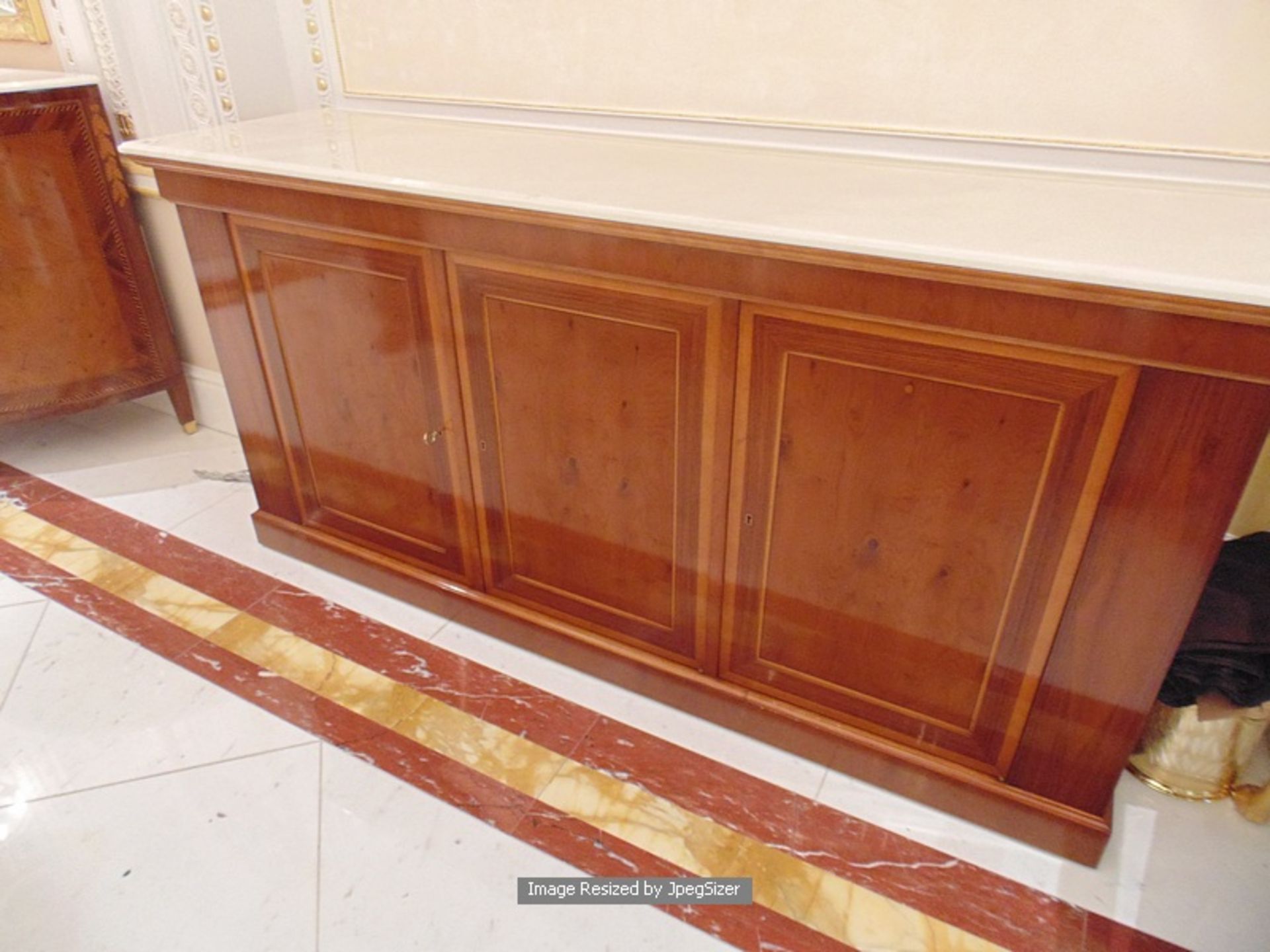 Georgian style flame mahogany and satinwood marble top sideboard, three panelled doors above a solid