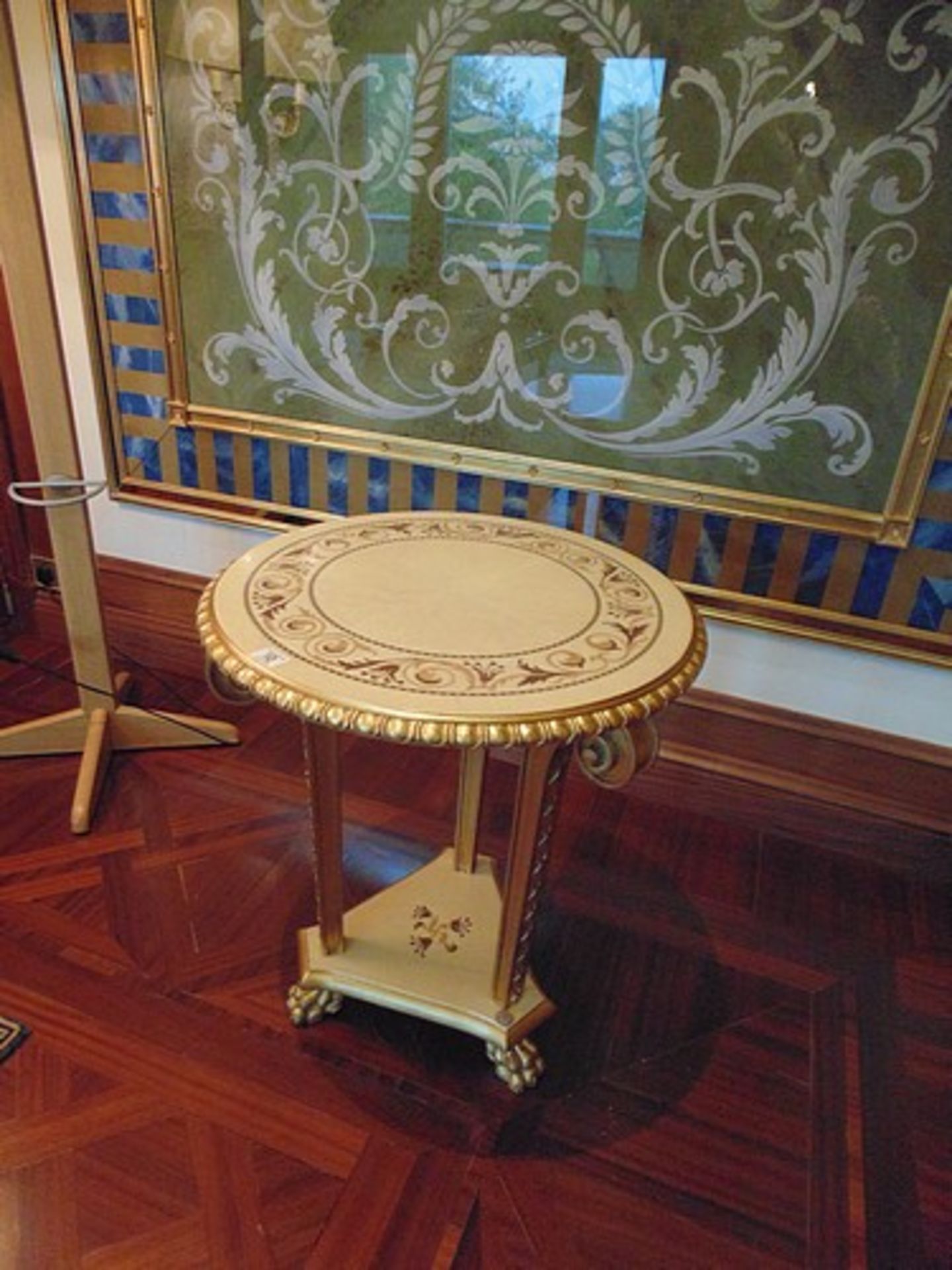 Continental parcel wood centre table 620mm diameter the top with floral motif mounted over three - Image 2 of 3