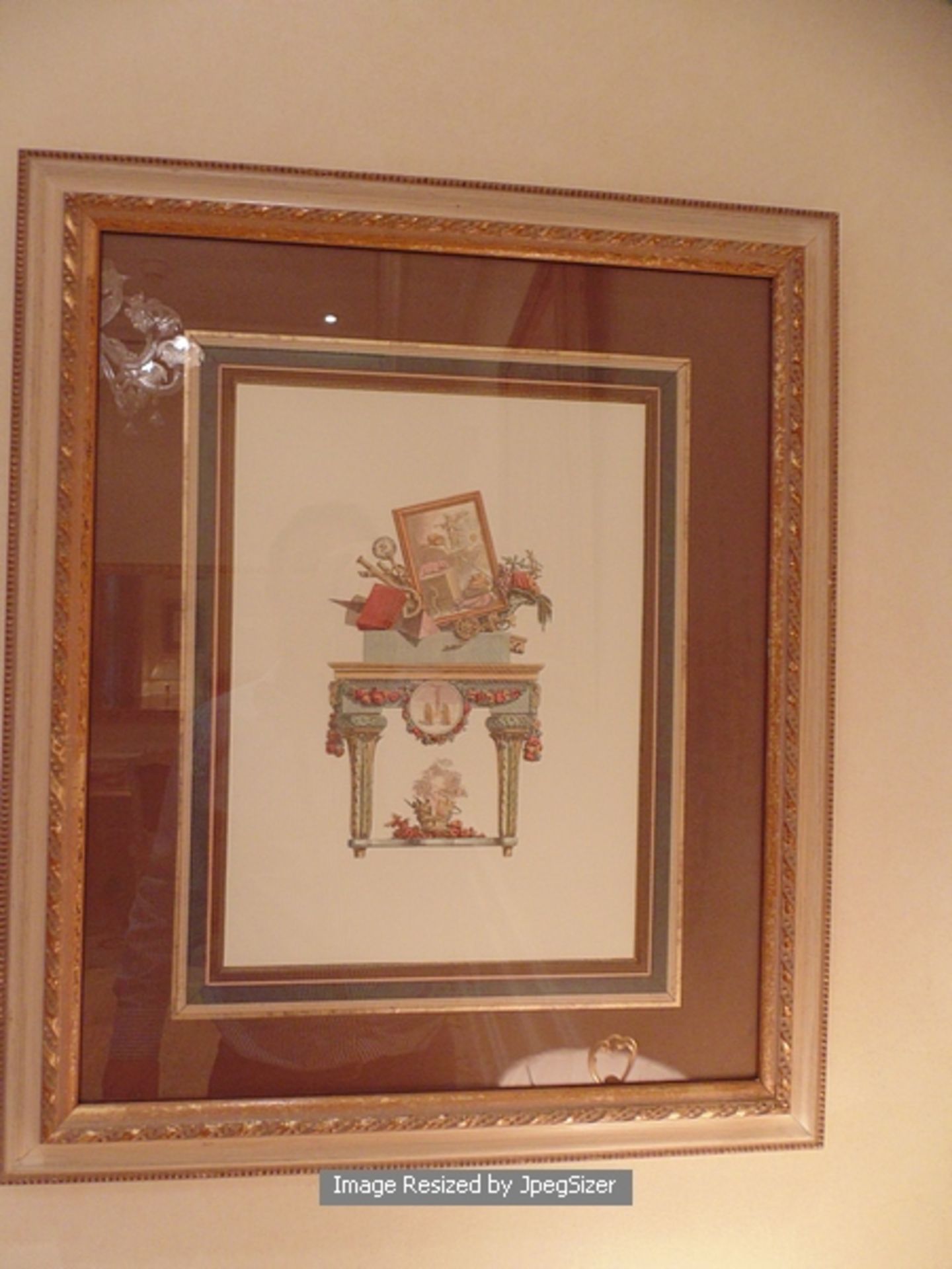 A pair of wooden framed prints of furniture 480mm x 560mm