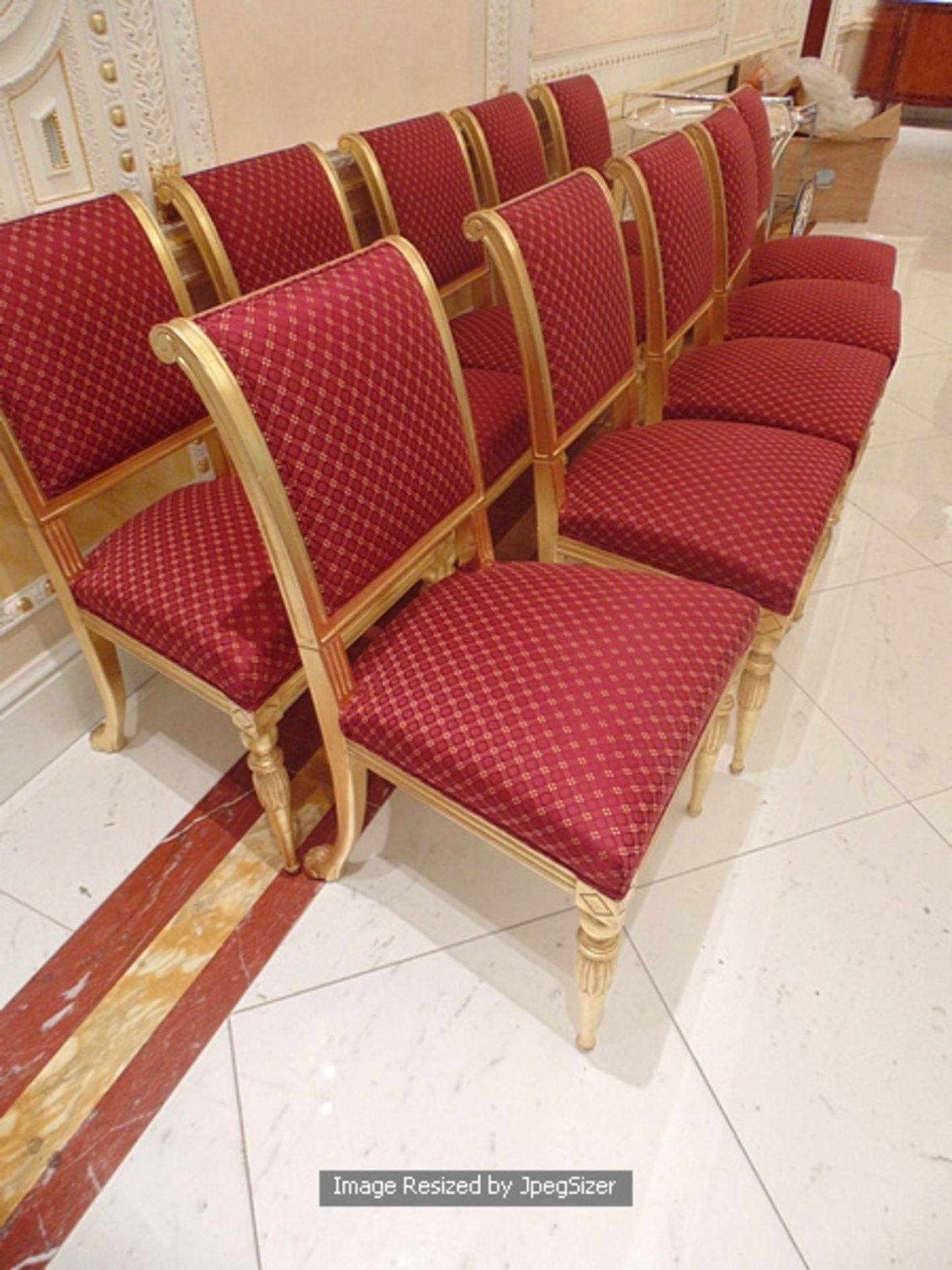 A set of 10 parcel-gilt dining chairs upholstered seat pad and backrest with splayed rear legs and - Image 3 of 3