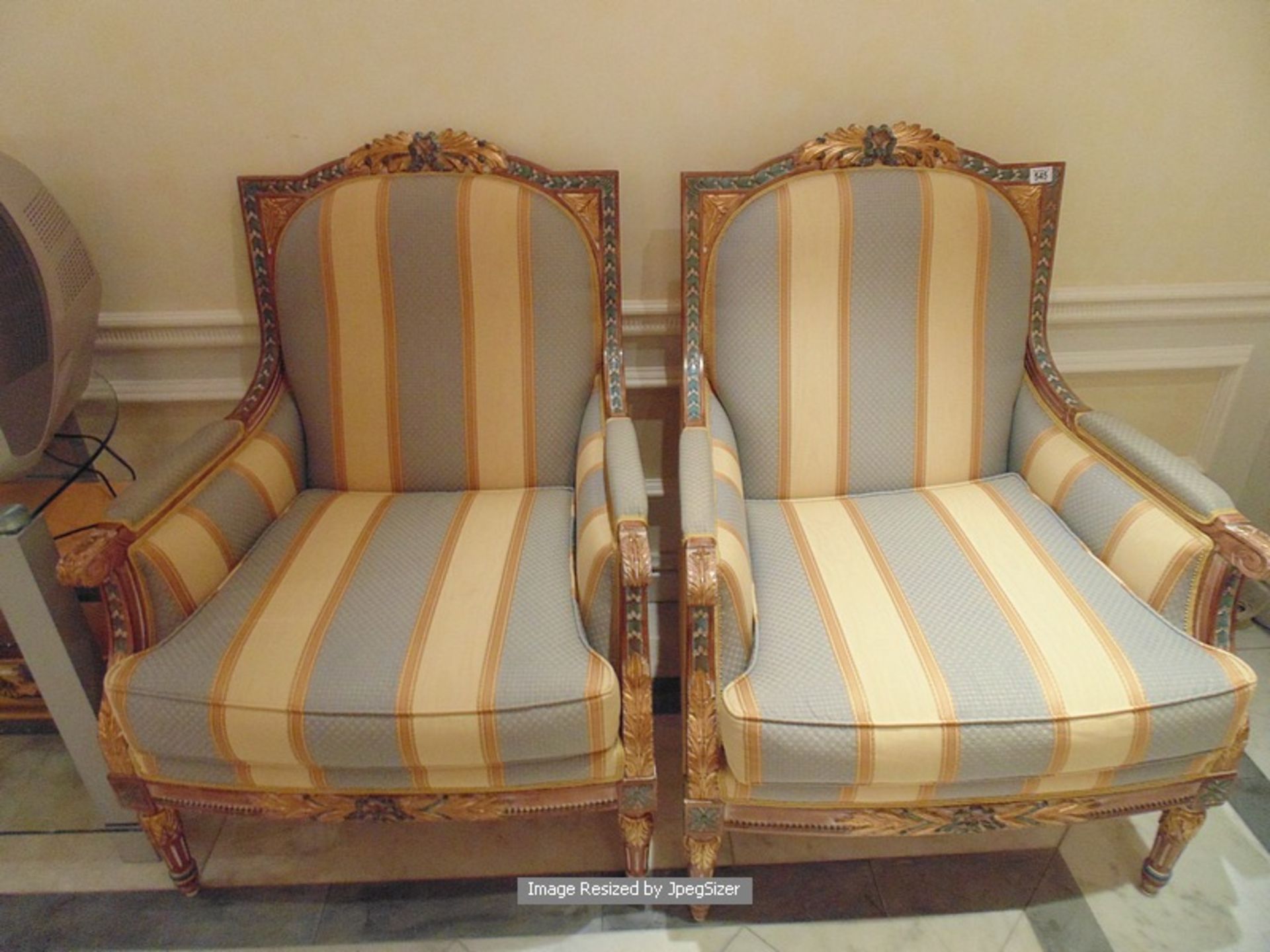 A pair of Italian late 18th century Neoclassical style armchairs parcel-gilt and polychrome Old