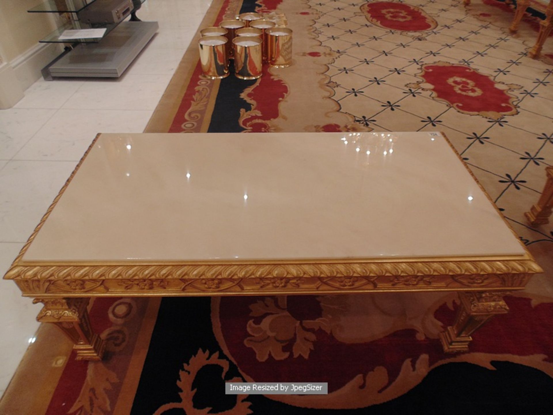 Neoclassical Italian painted and parcel gilt coffee table with marble top, rope edge frame with a