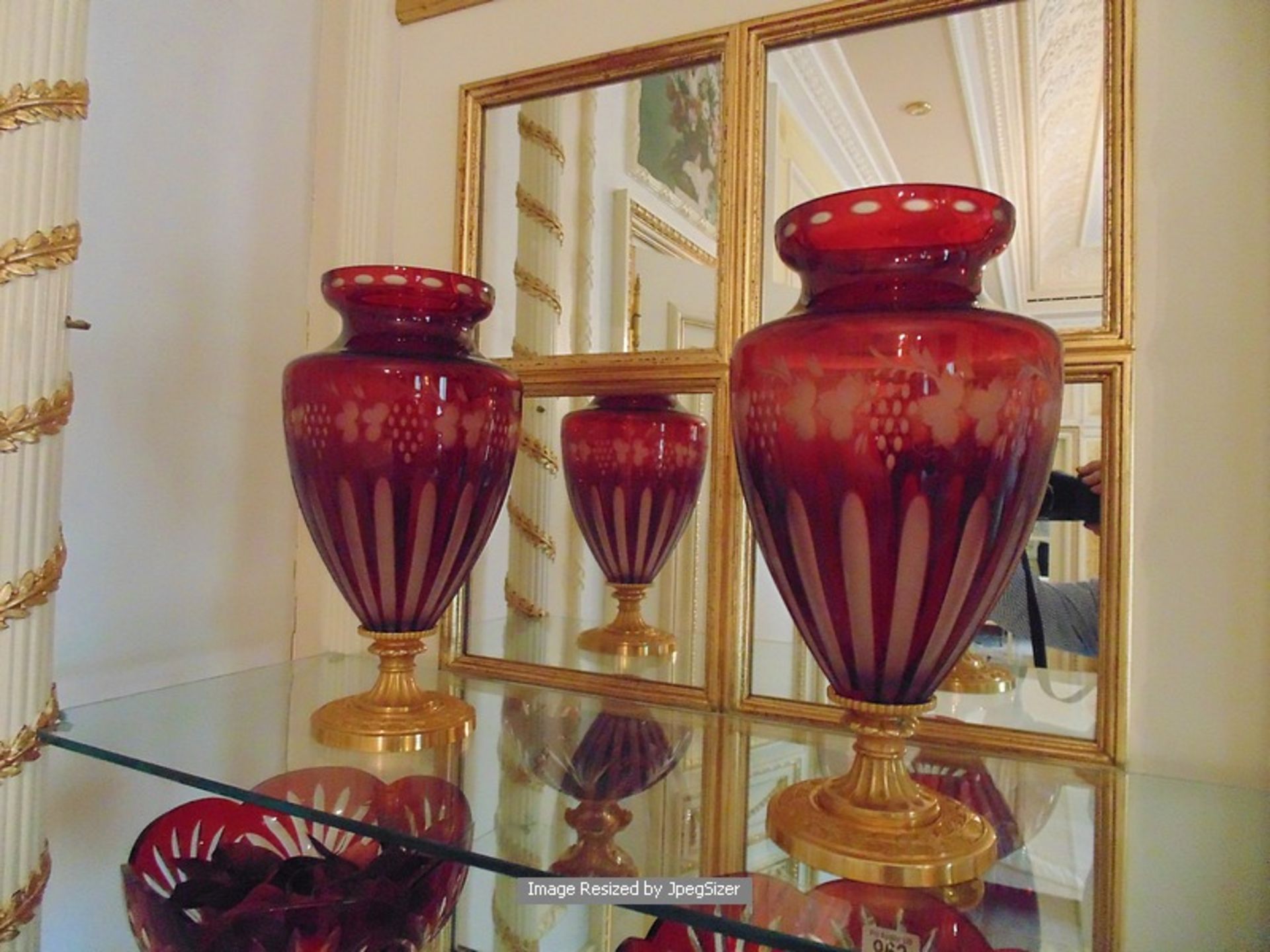 A pair of Baldi Home Jewels stunning ruby red and clear crystal vases mounted on bronze plinth 340mm