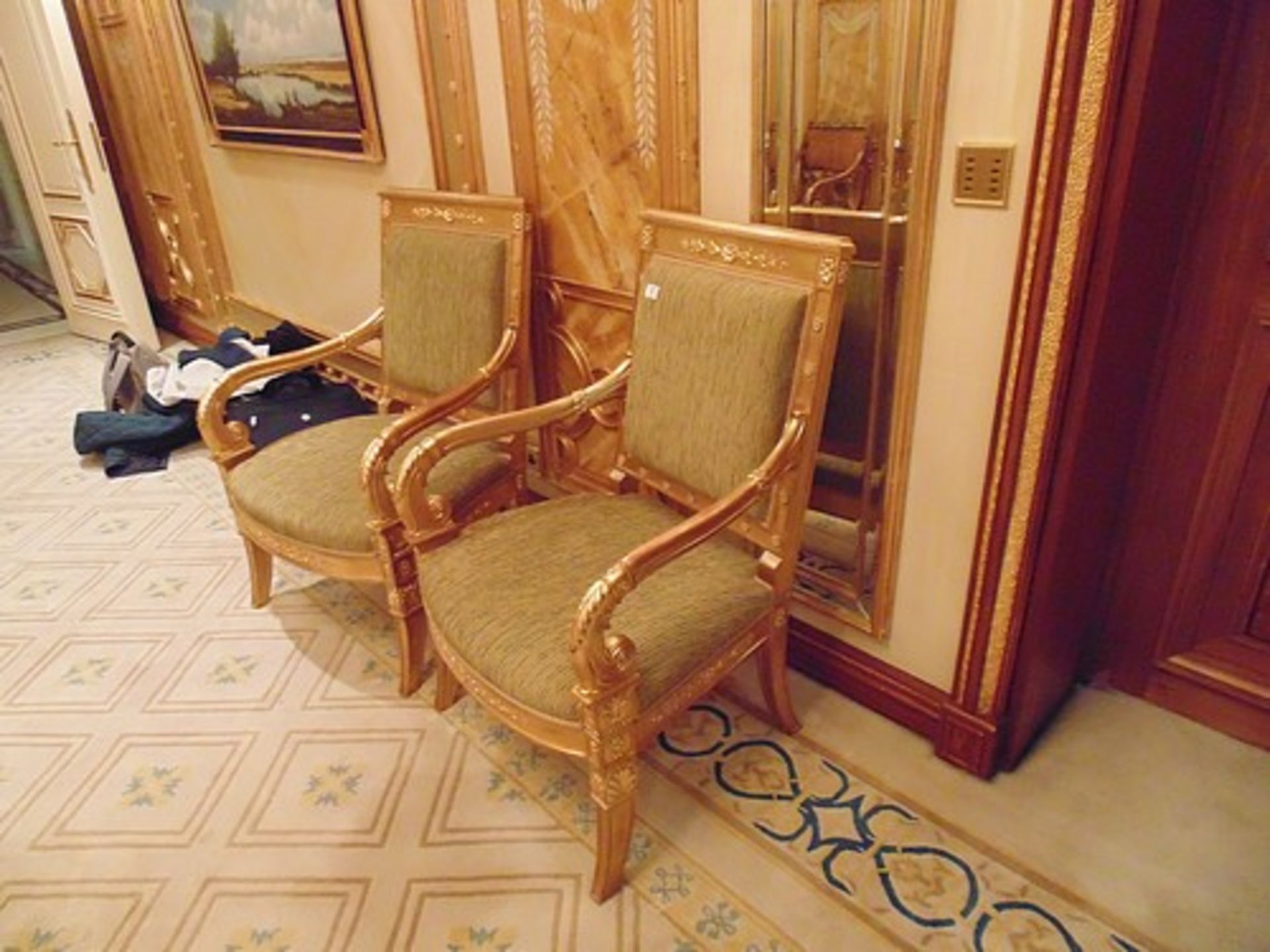 A pair of Empire style giltwood armchairs the back rest with panelled top rail decorated with - Image 2 of 2