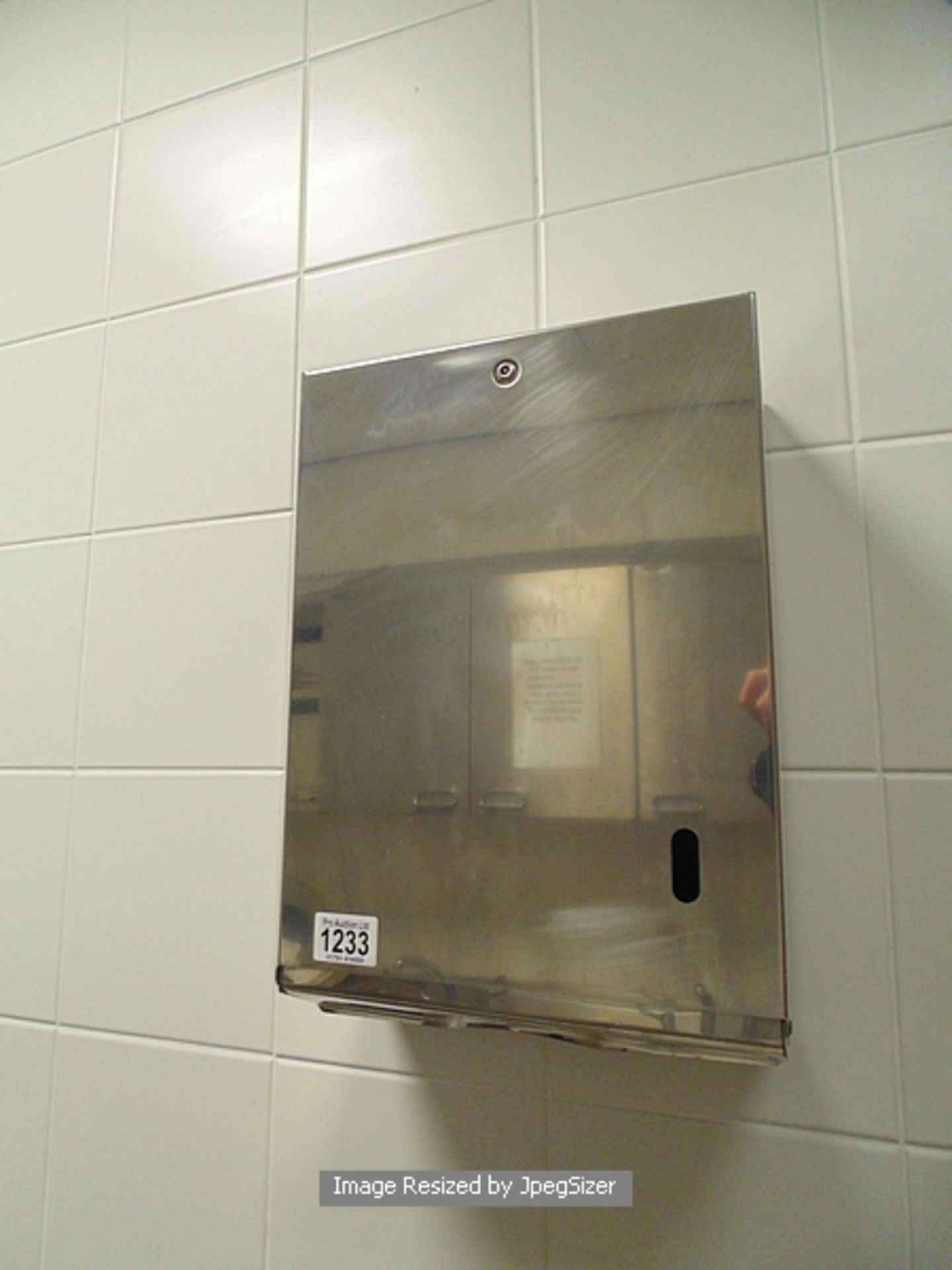 Stainless steel paper towel dispenser