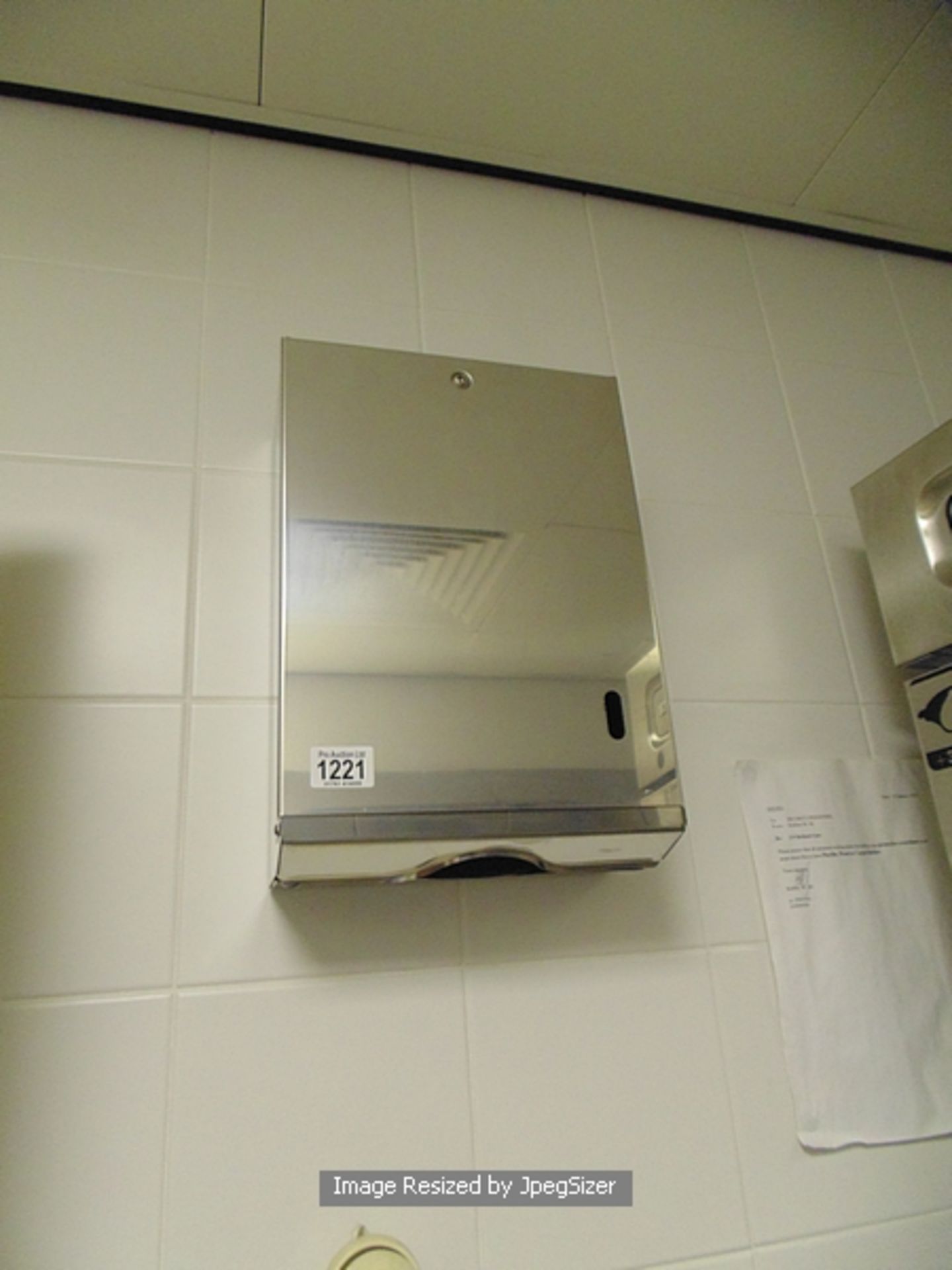 Stainless steel paper towel dispenser