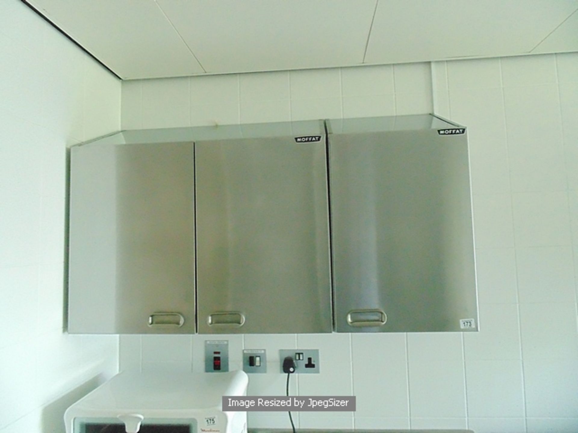 Moffat stainless steel wall cupboards comprising of two double door and one single door unit