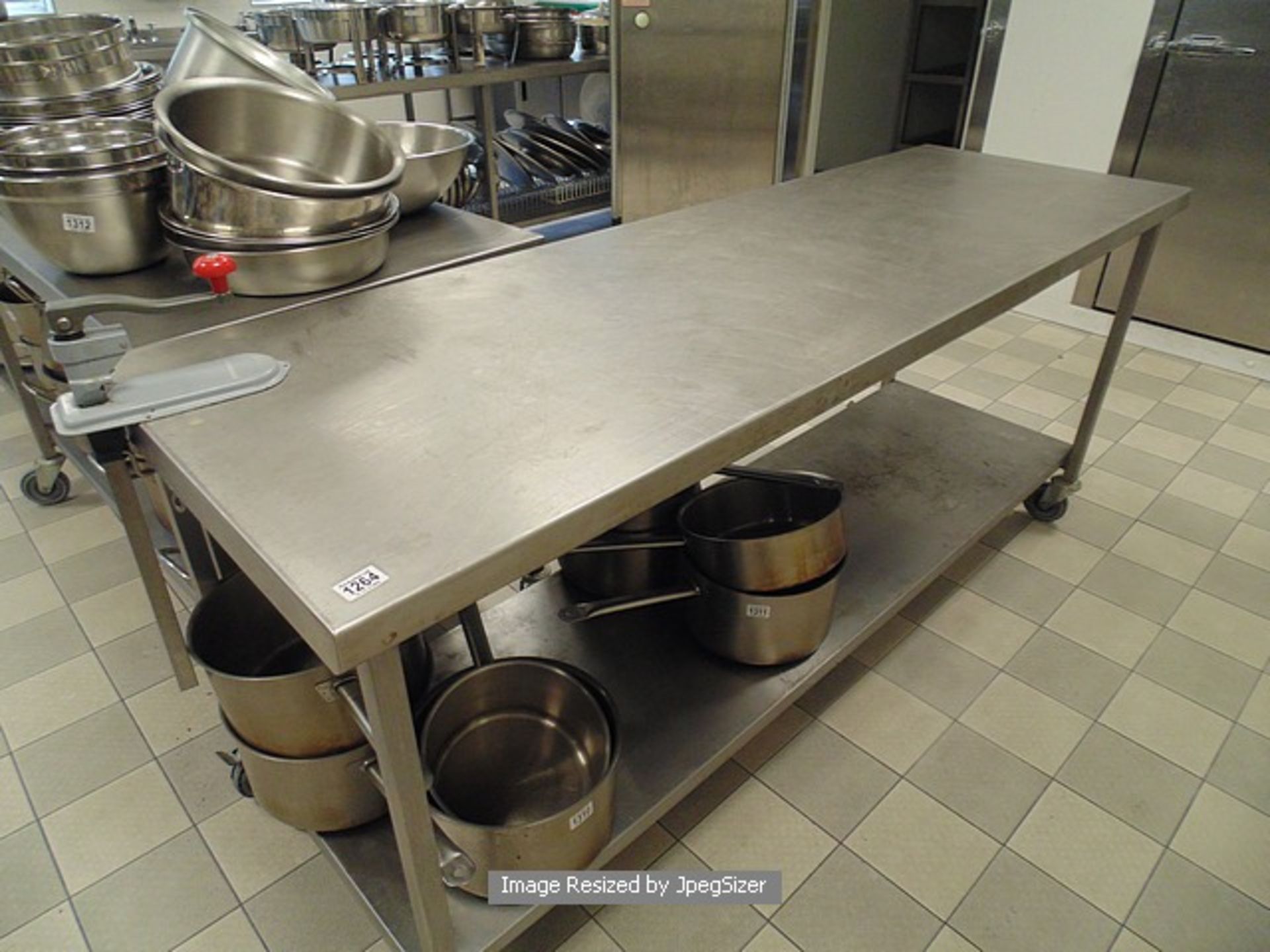 Moffat stainless steel mobile preparation table with under shelf and can opener 2000mm x 640mm x