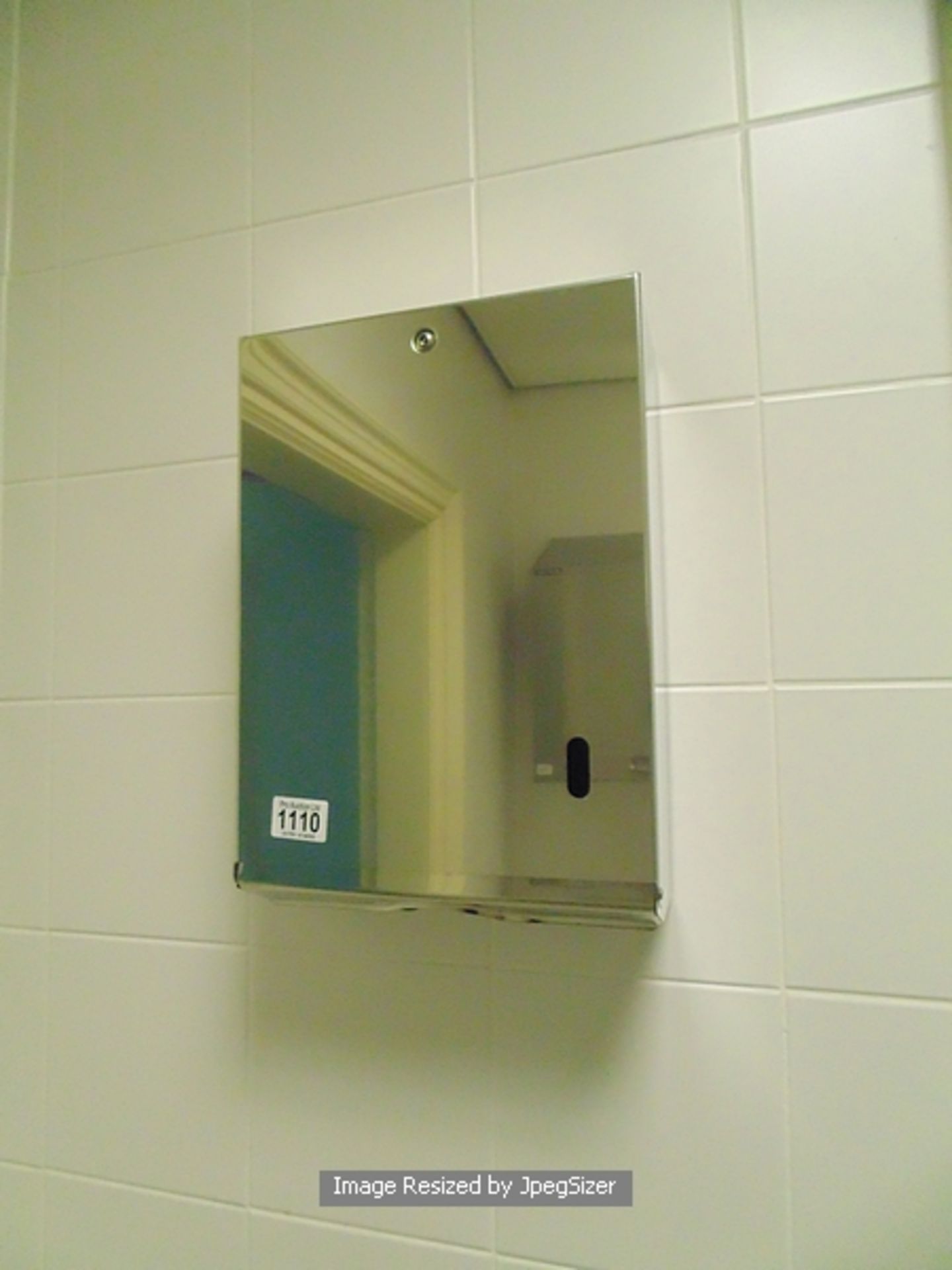 Stainless steel paper towel dispenser