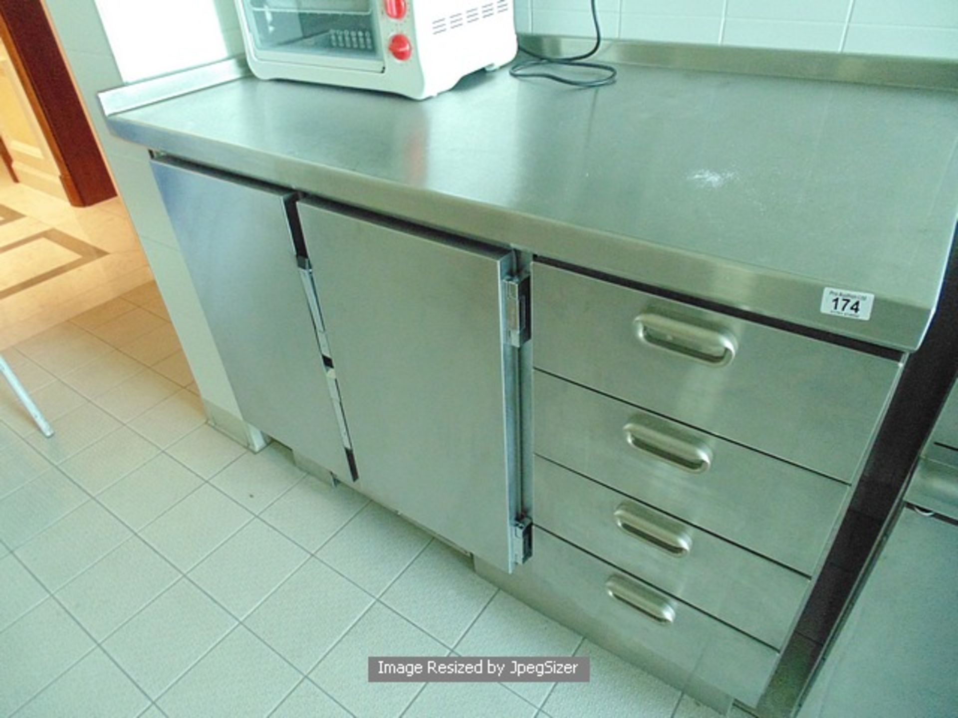 Moffat stainless steel two door under counter bench chiller complete with four drawer cupboard