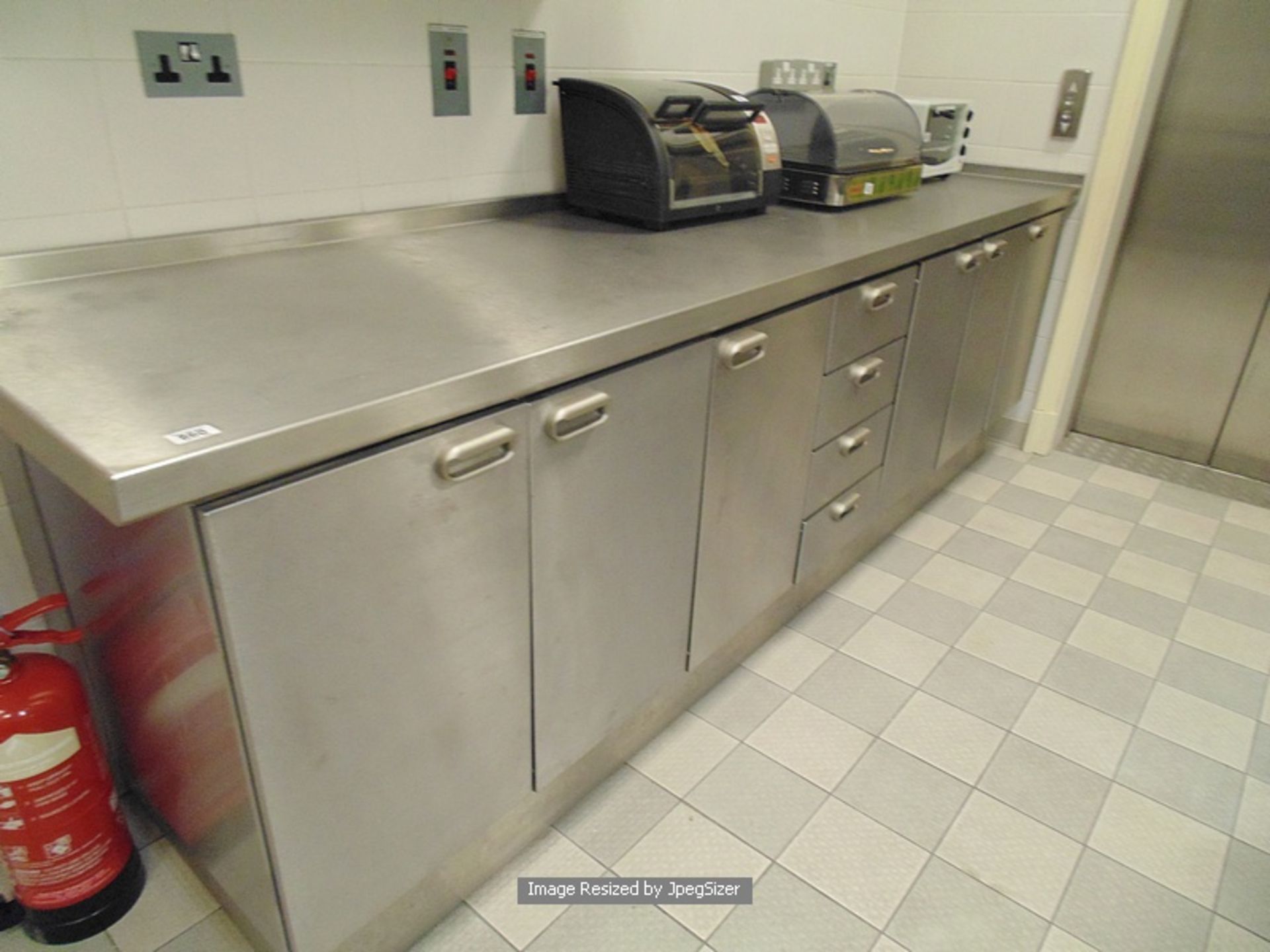 Moffat stainless steel workstation comprising of 2 x three door cupboard 1 x four drawer unit and