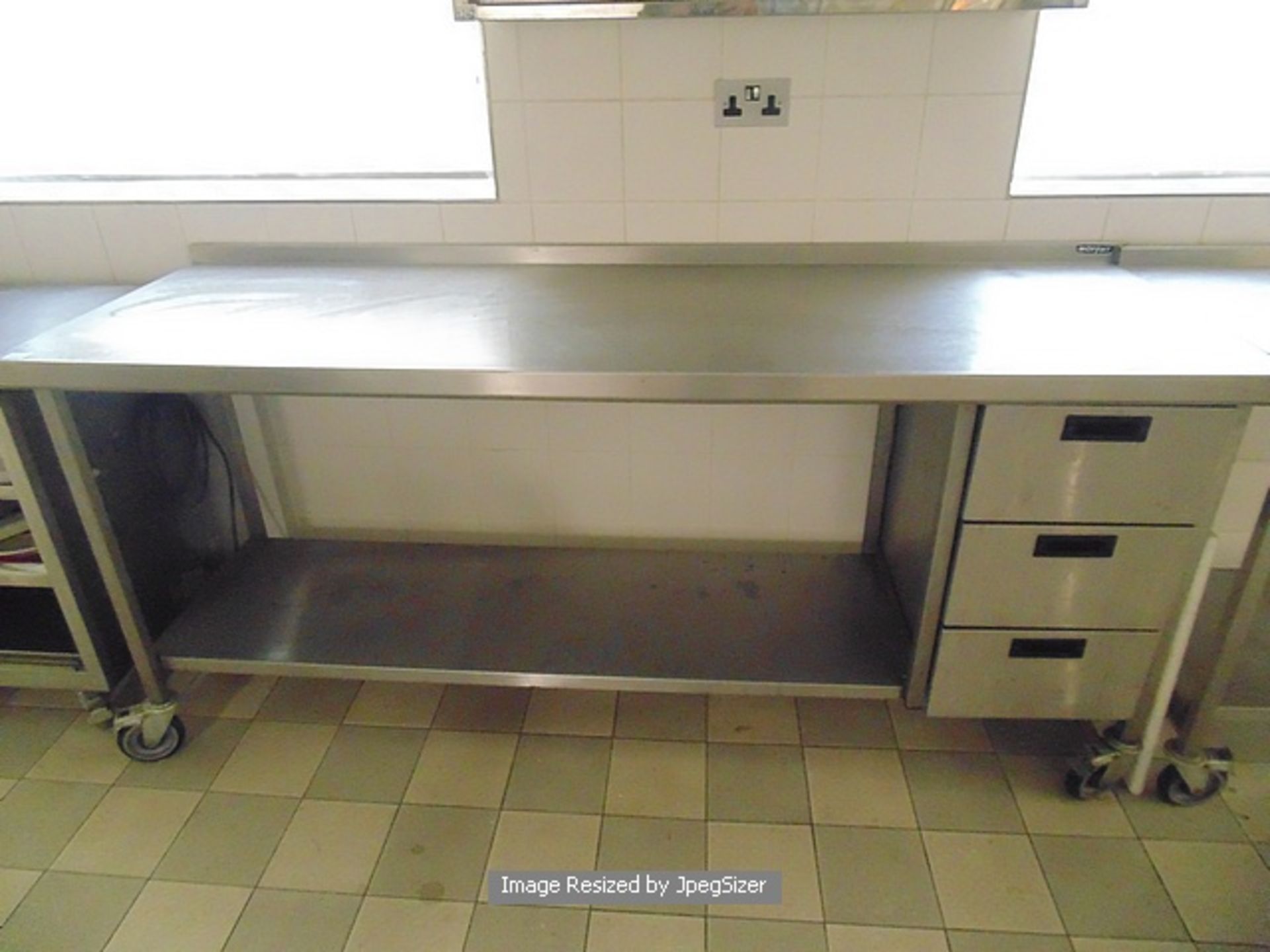 Moffat stainless steel mobile preparation table with up stand under shelf and three integral drawers