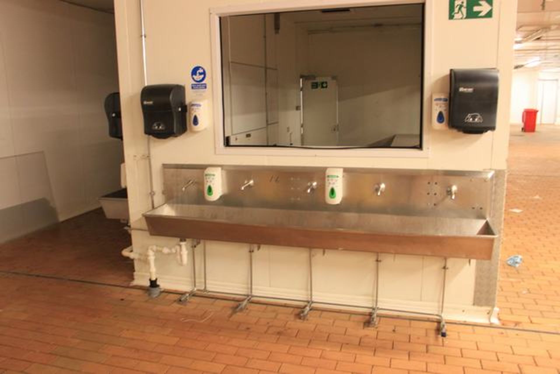 Stainless steel five station knee operated sink with 2 x towel dispensers