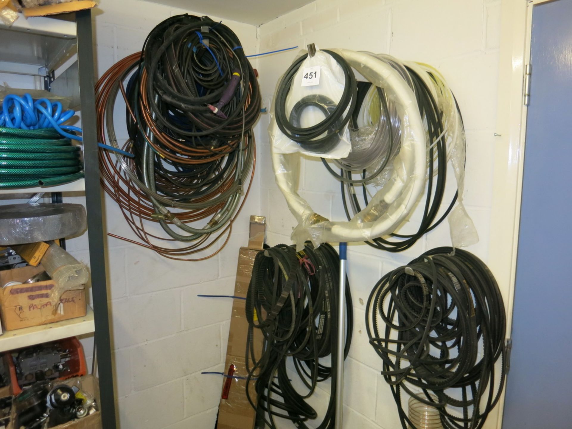 [Lot] Hose  belts and tubing, mounted on wall LIFT OUT £5