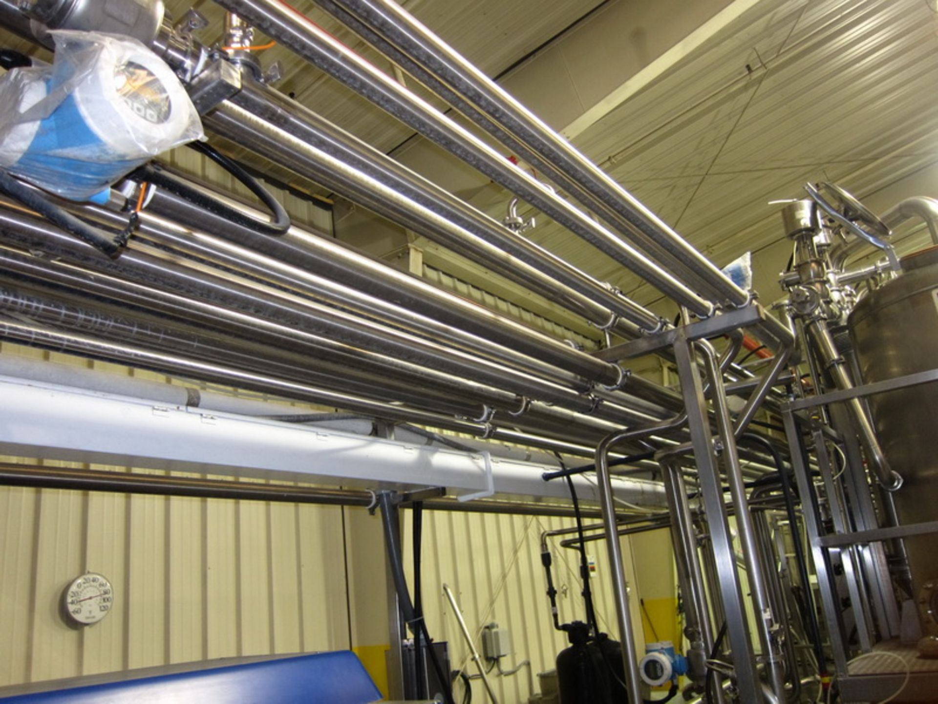 [Lot] Stainless pipework, located in process room includes: inline refractometer, (5) flow valves - Image 7 of 14