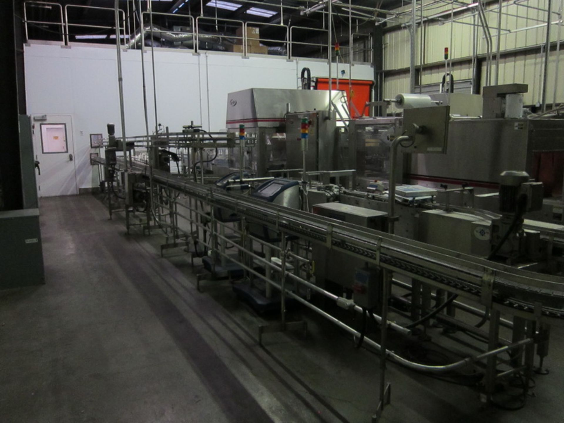 [Lot] Dairy Conveyor Corp. table top conveyors, extending from filling room to checkweigh in tray - Image 5 of 8