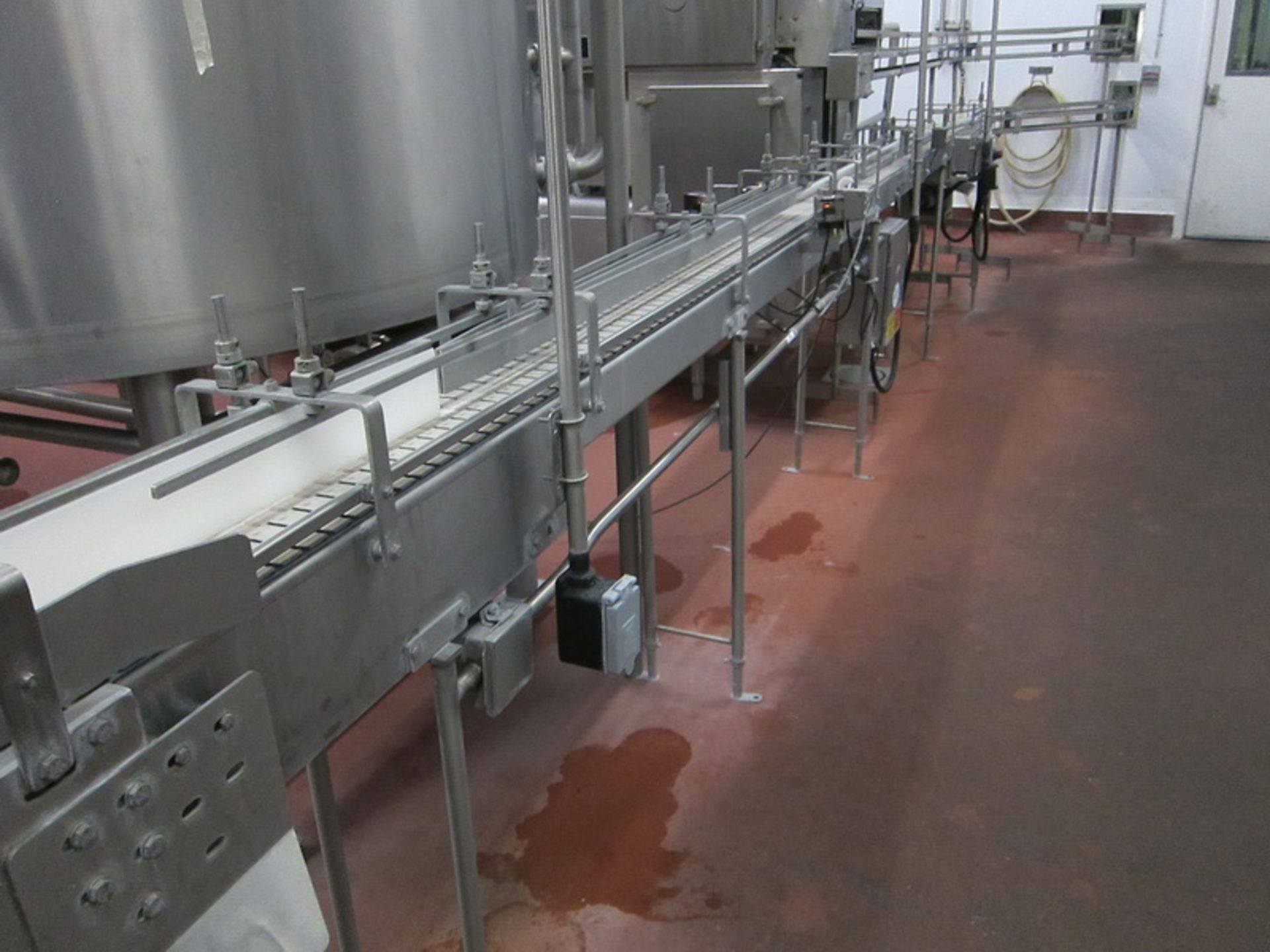 [Lot] Dairy Conveyor Corp. table top conveyors, extending from filling room to checkweigh in tray - Image 2 of 8