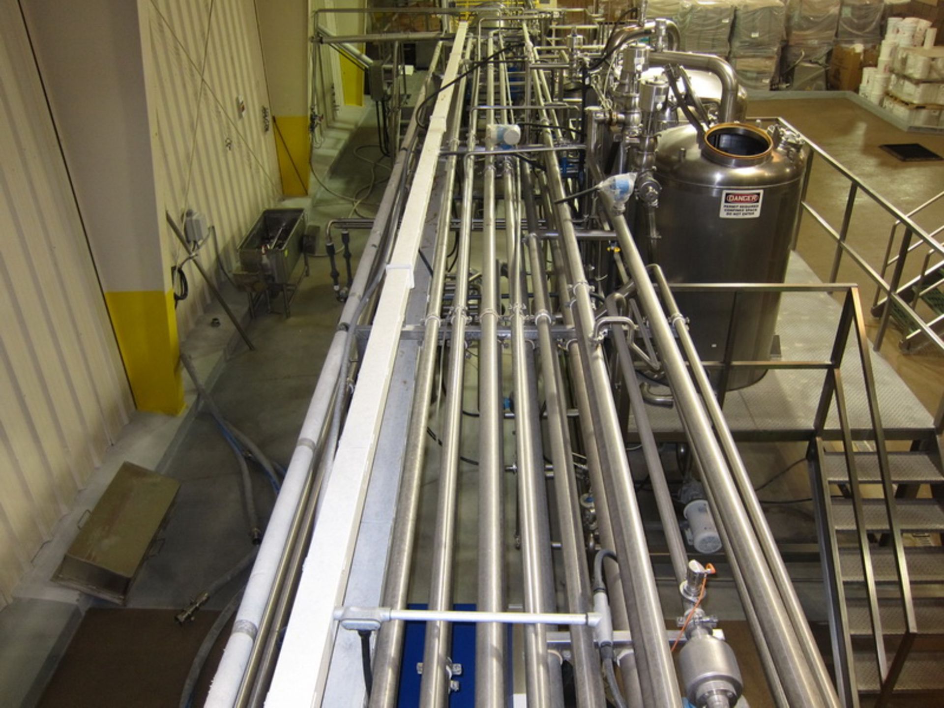 [Lot] Stainless pipework, located in process room includes: inline refractometer, (5) flow valves - Image 5 of 14