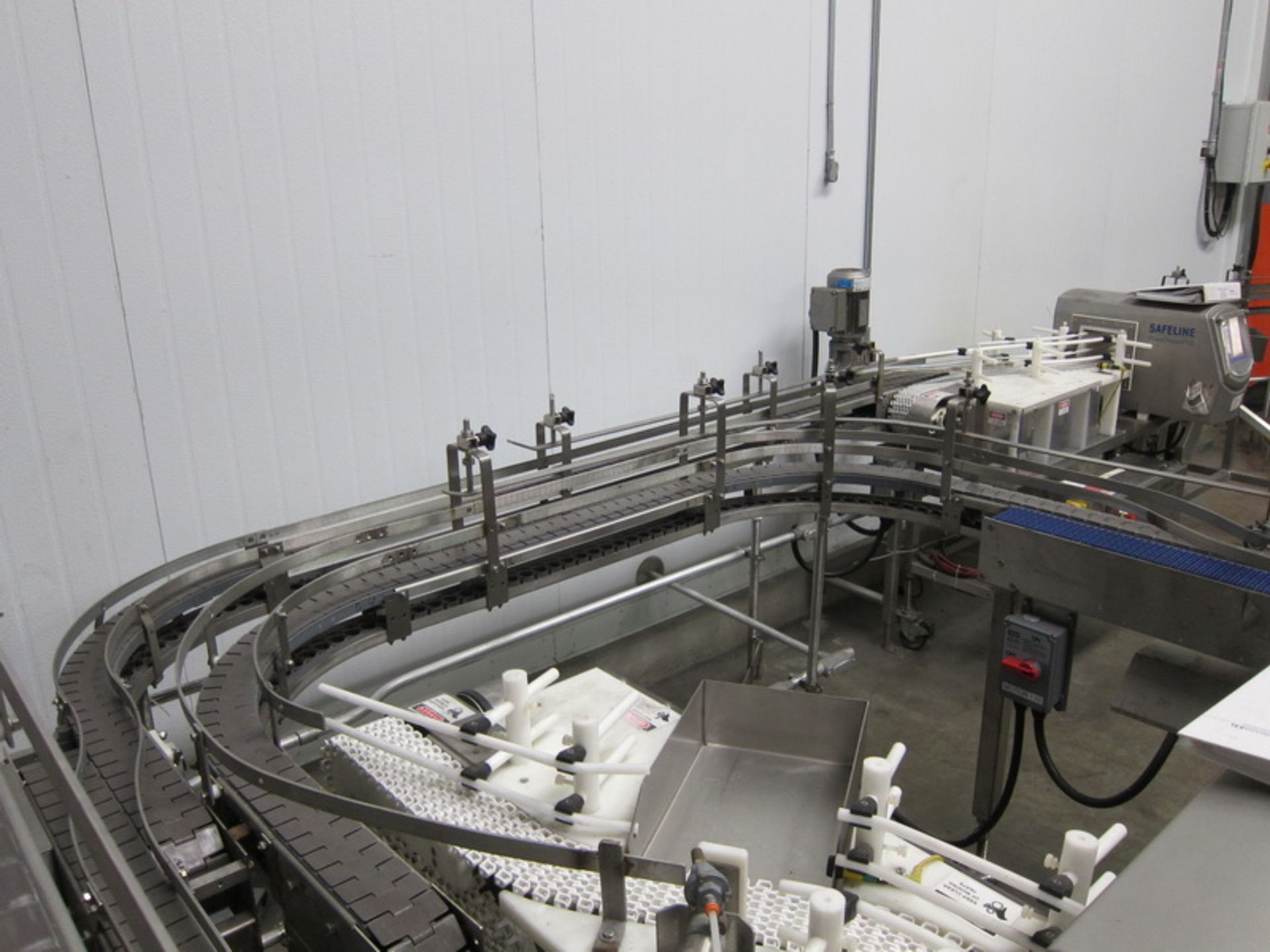 [Lot] Dairy Conveyor Corp. table top conveyors, extending from filling room to checkweigh in tray - Image 7 of 8