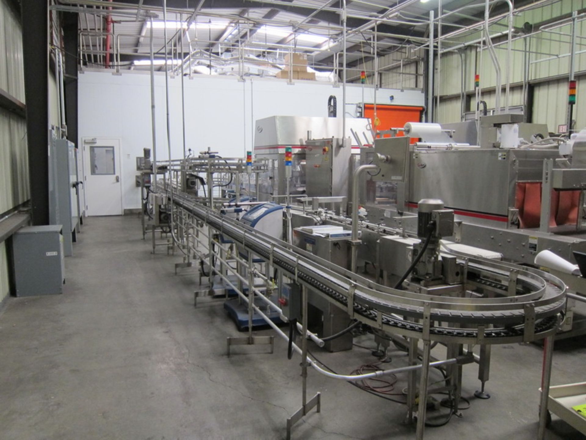 [Lot] Dairy Conveyor Corp. table top conveyors, extending from filling room to checkweigh in tray - Image 6 of 8