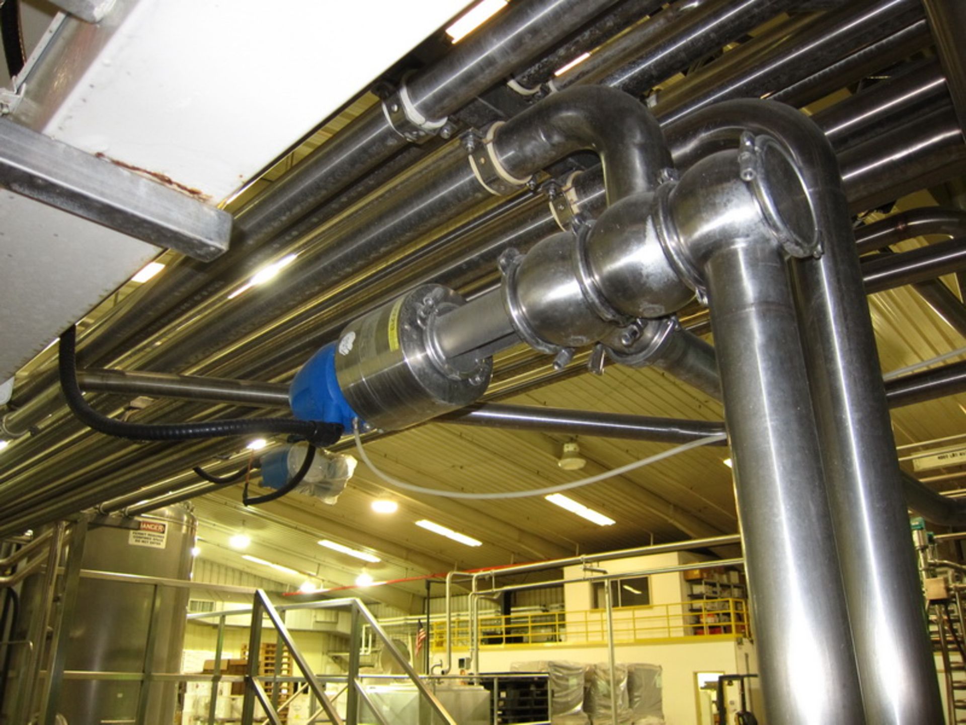[Lot] Stainless pipework, located in process room includes: inline refractometer, (5) flow valves - Image 9 of 14