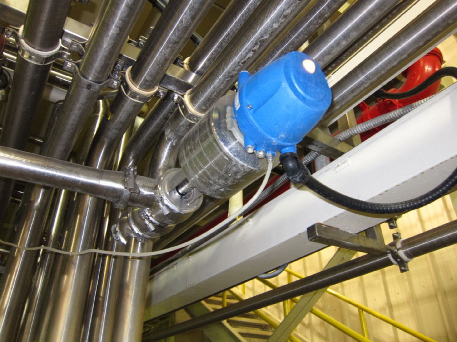 [Lot] Stainless pipework, located in process room includes: inline refractometer, (5) flow valves - Image 10 of 14