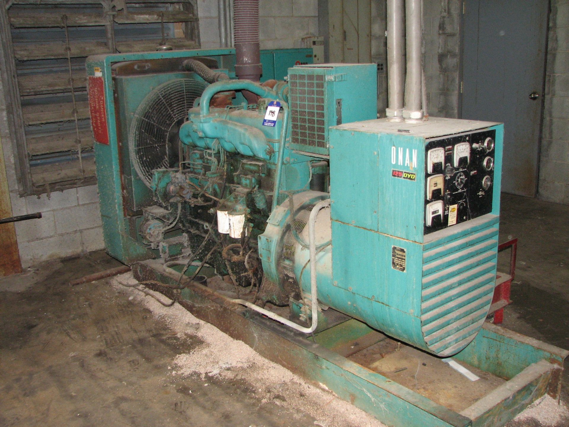 Onan backup generator, model 125 ODYD 15R/1H, s/n A790380018, diesel powered, rated 125 KW/