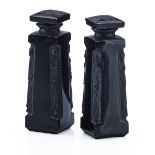 LALIQUETwo "Ambre D'Orsay" perfume bottles, black glass, France, des. 1911 M p. 933 no. 1 Molded