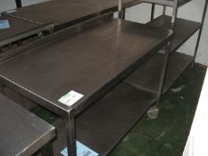 STAINLESS STEEL TABLE ON WHEELS HAS SOME HOLES IN THE TOP SEE PICTURE