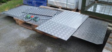 Chequer plate sheeting panels, emergency stop button