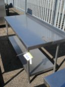 STAINLESS STEEL TABLE - HOLES FOR CAN OPENER - 70.5" X 27.5" X 32"