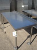 STAINLESS STEEL TABLE ON WHEELS - 70" X 27.5" X 33.5"