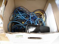 Box of assorted switchers, routers and cables.