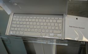 Boxed Apple wireless keyboard.