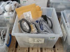 Box of assorted computer cables.