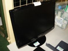 SAMSUNG flatscreen monitor.