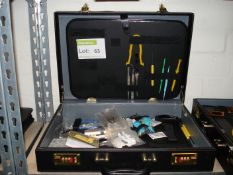 Technician's tools in briefcase.