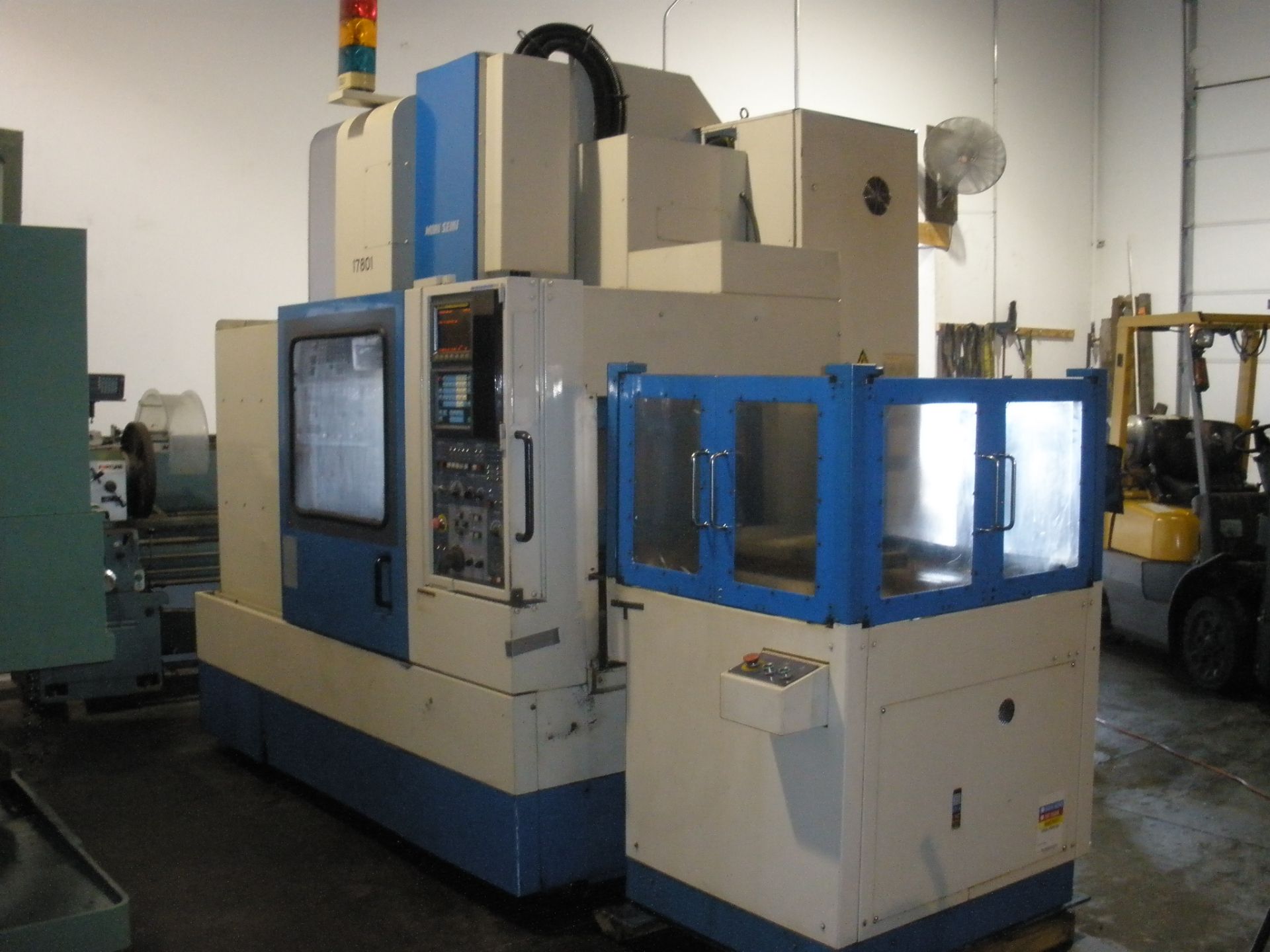 Mori Seiki MV-40B CNC Mill Fanuc OMC Control,Chip Conveyor ,Pallet Changer W/ Video