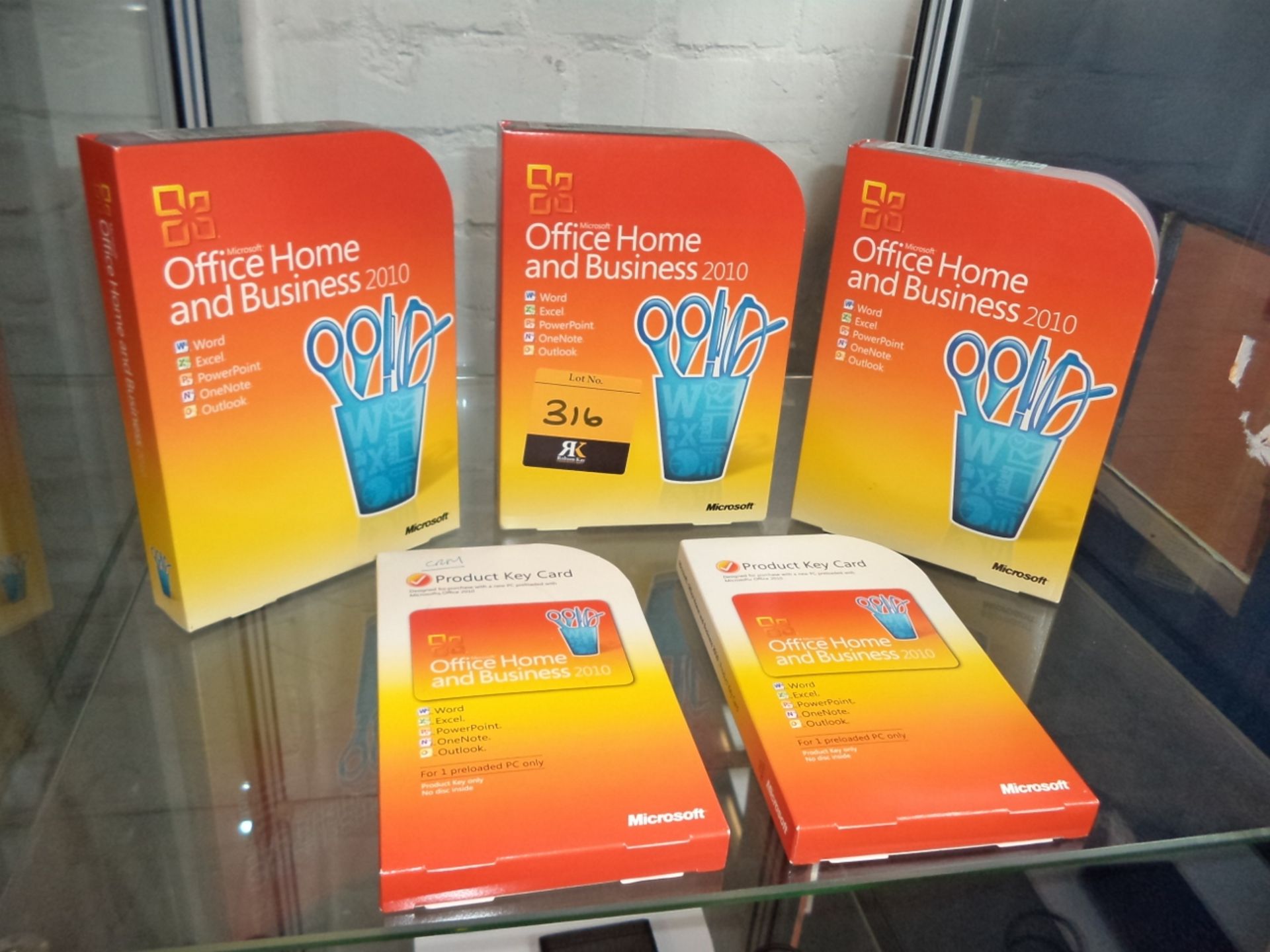 5 off Microsoft Office Home & Business 2010 software packs, 3 of which consist of larger boxes which