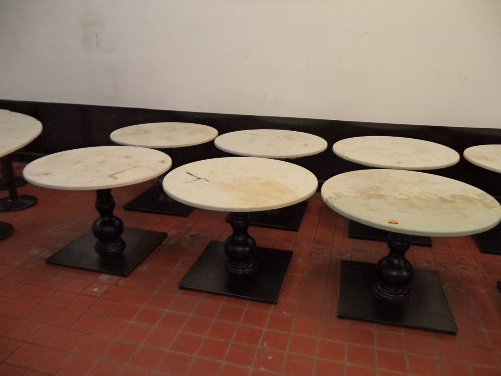 6 off 105cm diameter round dining tables.  The height of these tables is very approximately