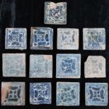 A set of 13 Manises blue and white tiles 15th C. All decorated in blue and white a stylized rose.